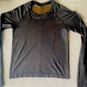 Lululemon Black and gold top Size 6